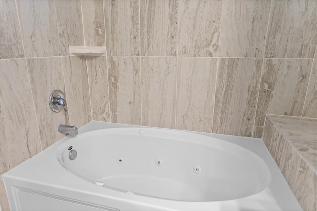 bathroom with a tub to relax in