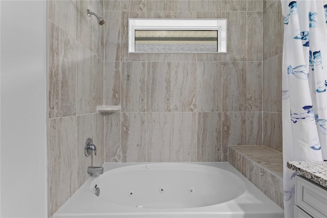 bathroom with shower / tub combo with curtain, plenty of natural light, and vanity