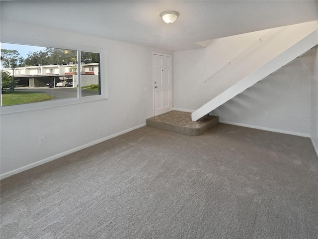 interior space featuring carpet