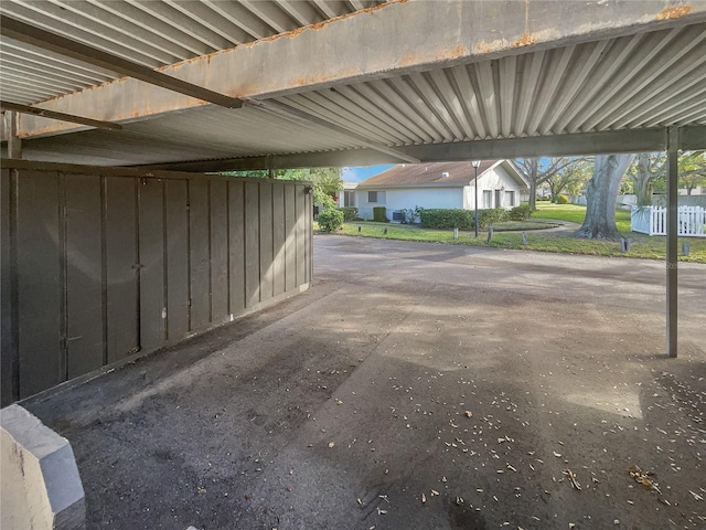 exterior space featuring a carport