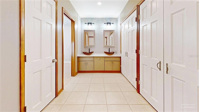 bathroom featuring tile patterned floors and vanity