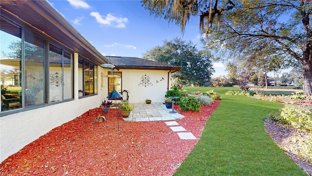 view of yard with a patio area