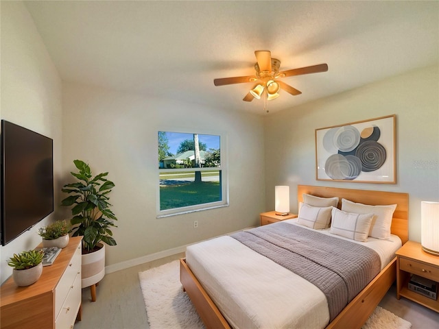 bedroom featuring ceiling fan