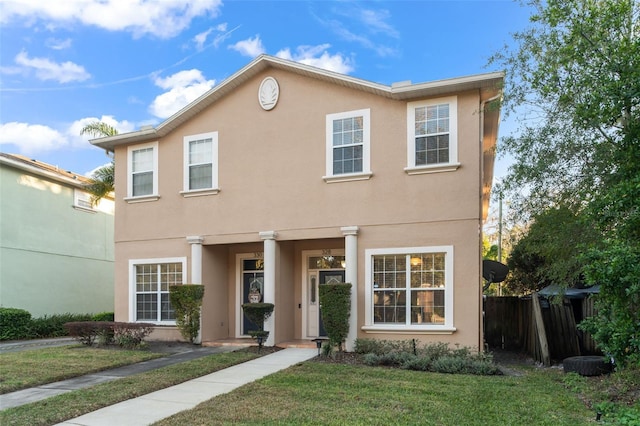 view of front of property with a front lawn