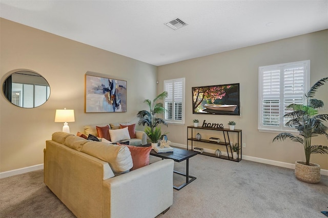 living room with light colored carpet