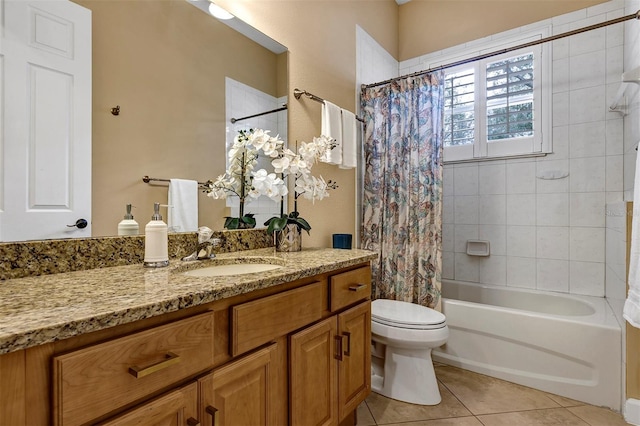 full bathroom featuring tile patterned floors, shower / bathtub combination with curtain, vanity, and toilet