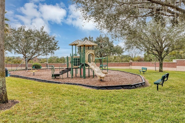 view of jungle gym featuring a yard