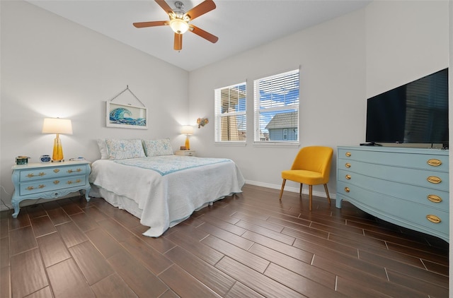 bedroom featuring ceiling fan and lofted ceiling