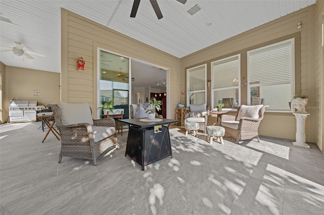 view of patio with outdoor lounge area, grilling area, and ceiling fan