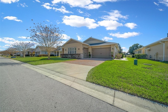 ranch-style house with a front yard and a garage