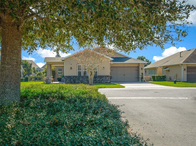 ranch-style house featuring a garage