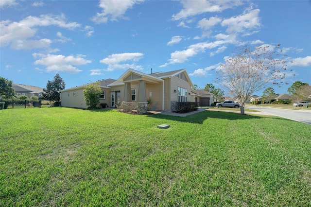 view of property exterior featuring a lawn