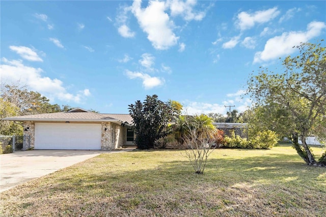 view of front of home featuring a garage and a front yard