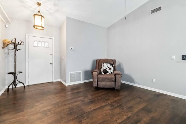 foyer featuring dark hardwood / wood-style floors