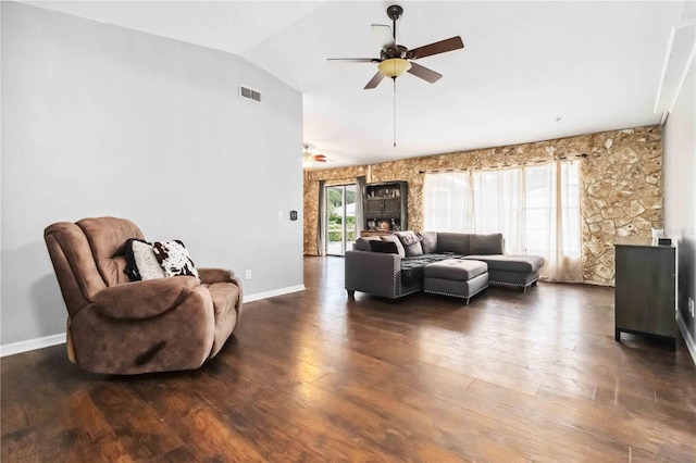 living room with vaulted ceiling, dark wood-type flooring, and ceiling fan