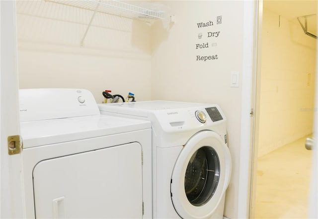 laundry area featuring separate washer and dryer