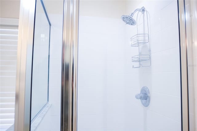 bathroom featuring an enclosed shower