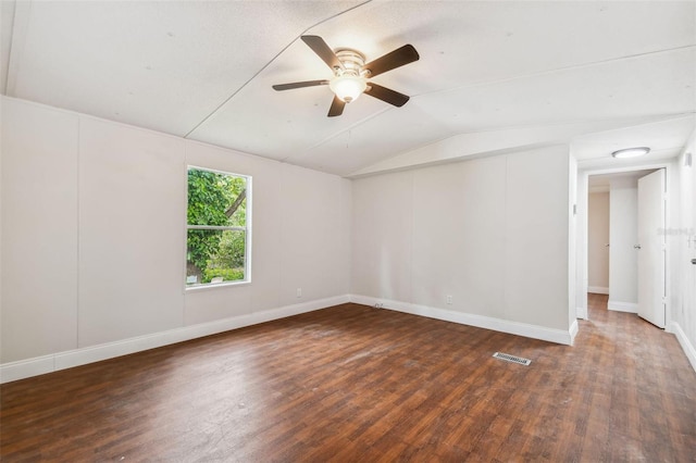 4611 Gall Blvd, Zephyrhills, FL 33542 - spare room with a ceiling fan, baseboards, visible vents, vaulted ceiling, and wood finished floors
