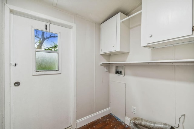 4611 Gall Blvd, Zephyrhills, FL 33542 - laundry room with baseboards, washer hookup, and cabinet space