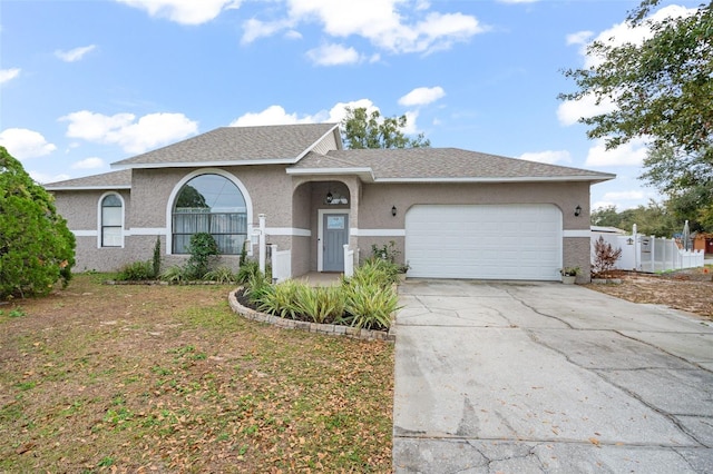 ranch-style home with a garage