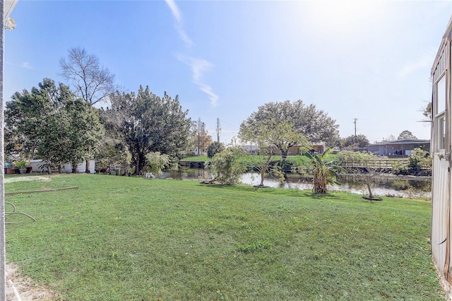 view of yard featuring a water view