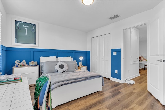 bedroom with wood-type flooring