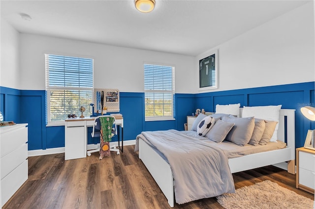 bedroom featuring dark hardwood / wood-style floors