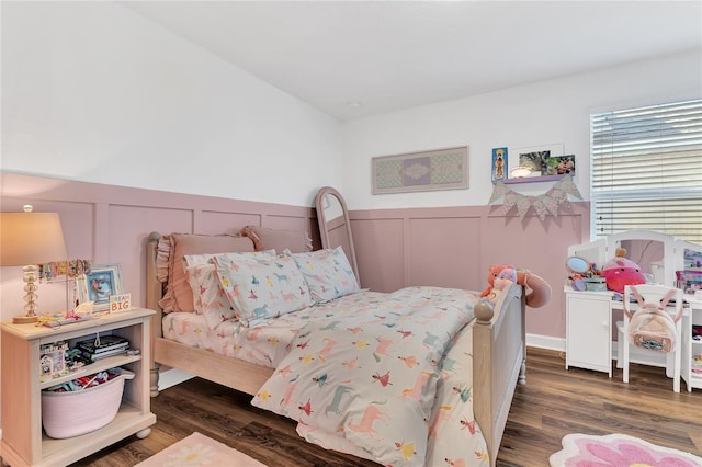 bedroom featuring dark hardwood / wood-style flooring