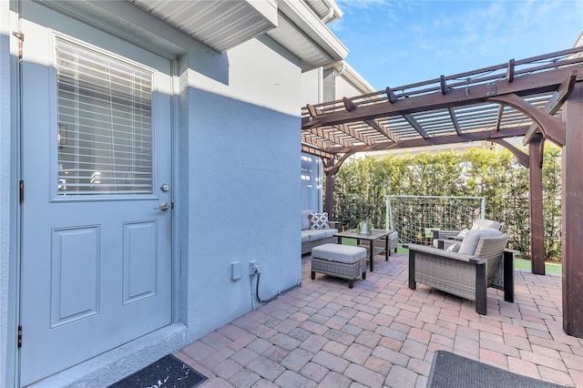 view of patio with a pergola and outdoor lounge area