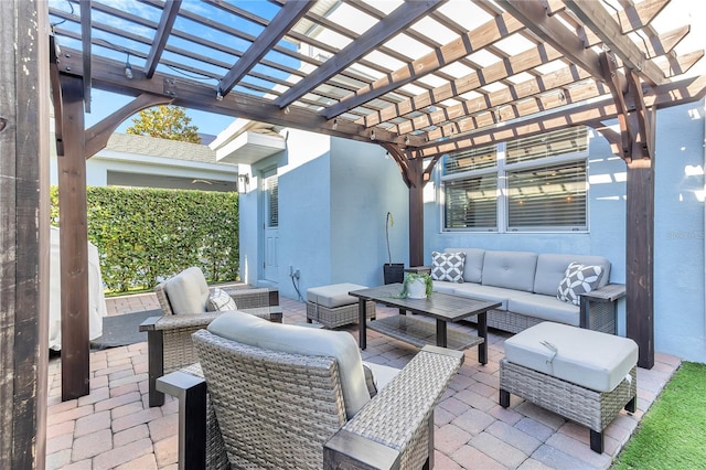 view of patio featuring an outdoor living space and a pergola