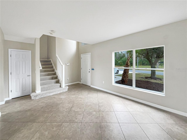 interior space featuring light tile patterned flooring