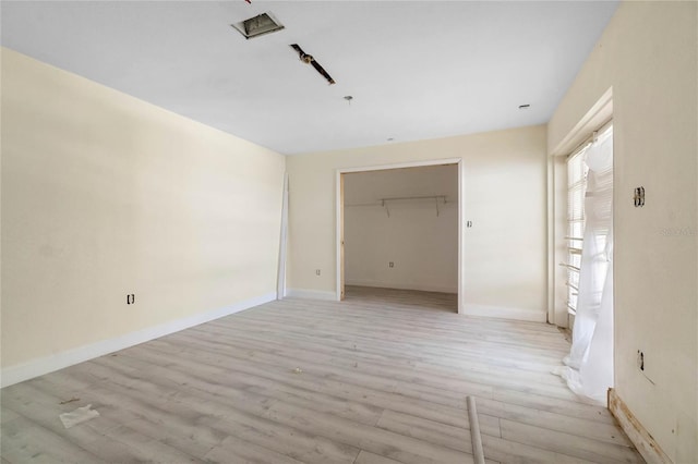 unfurnished bedroom with light hardwood / wood-style flooring