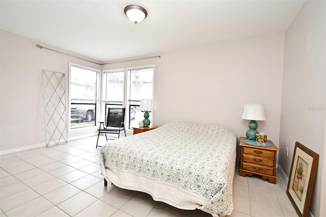 bedroom featuring light tile patterned floors