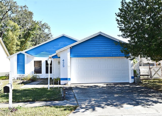 view of front of house with a garage