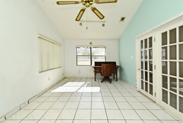 interior space with ceiling fan and vaulted ceiling