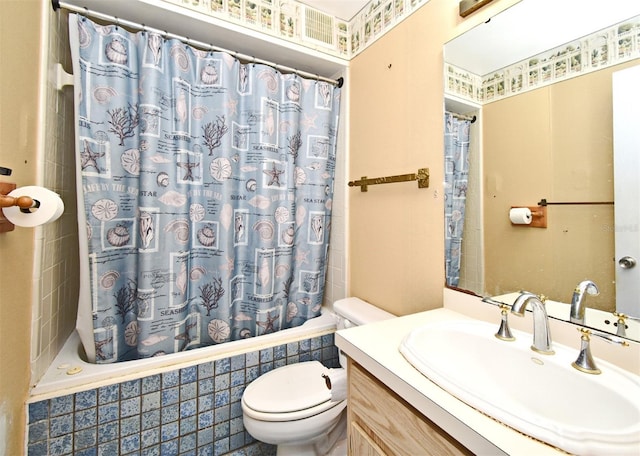 full bathroom with vanity, shower / bathtub combination with curtain, and toilet