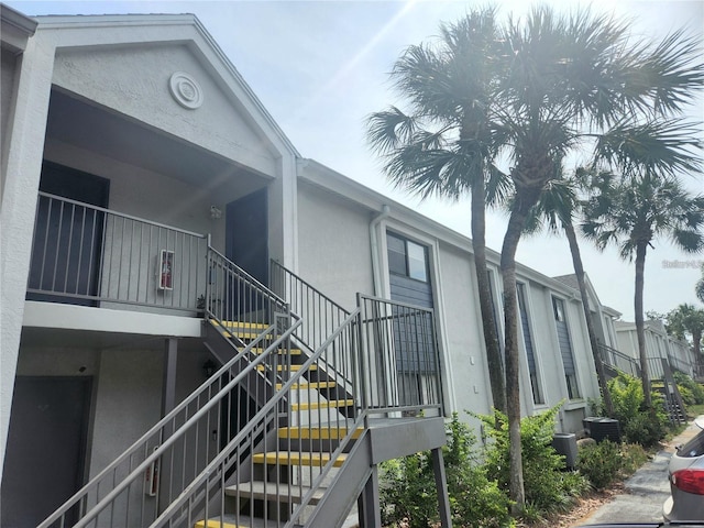 view of property with central AC unit