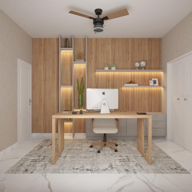 office area featuring built in desk and ceiling fan