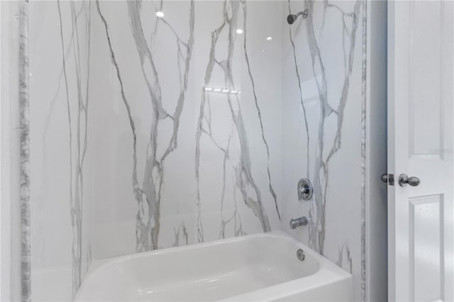 bathroom featuring shower / washtub combination