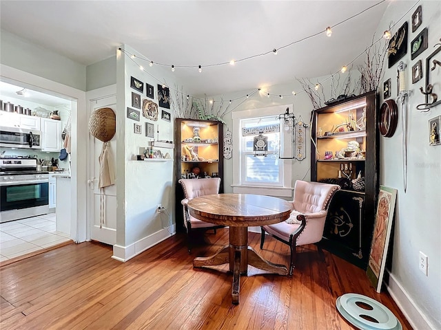 dining room with light hardwood / wood-style flooring