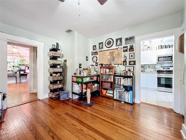 misc room with wood-type flooring