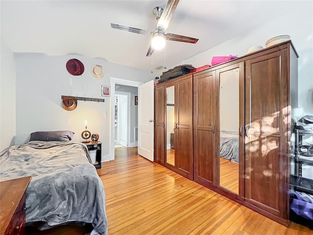 bedroom featuring ceiling fan and light wood-type flooring