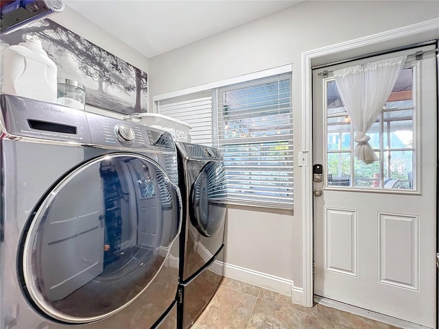 washroom with separate washer and dryer