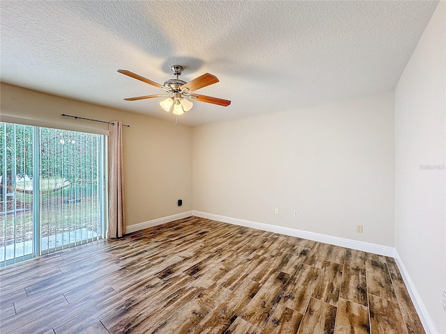 unfurnished room featuring a textured ceiling, hardwood / wood-style flooring, and ceiling fan