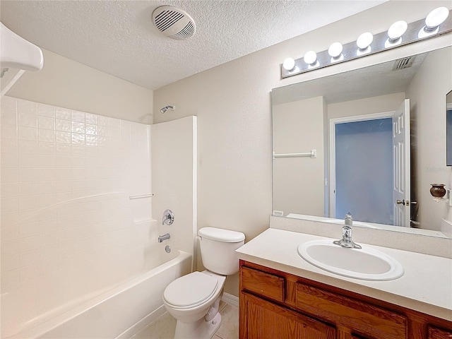 full bathroom featuring vanity, shower / tub combination, a textured ceiling, and toilet