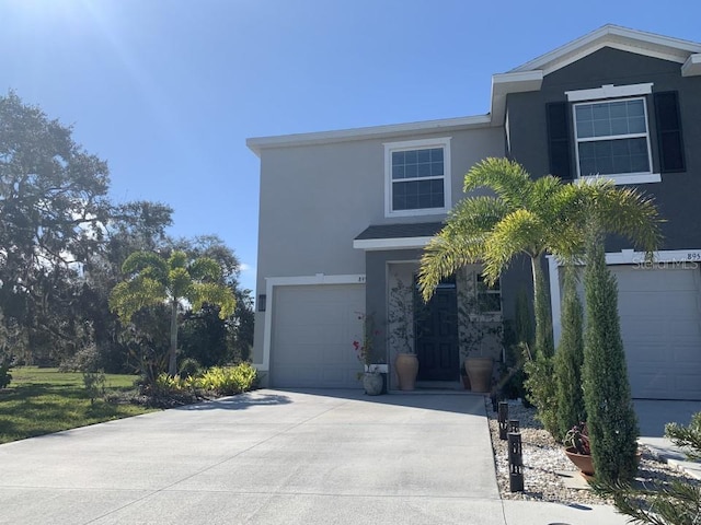 view of front of home with a garage