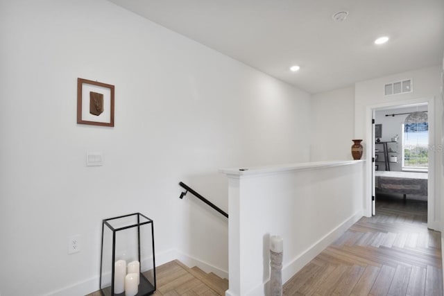 corridor with light parquet flooring