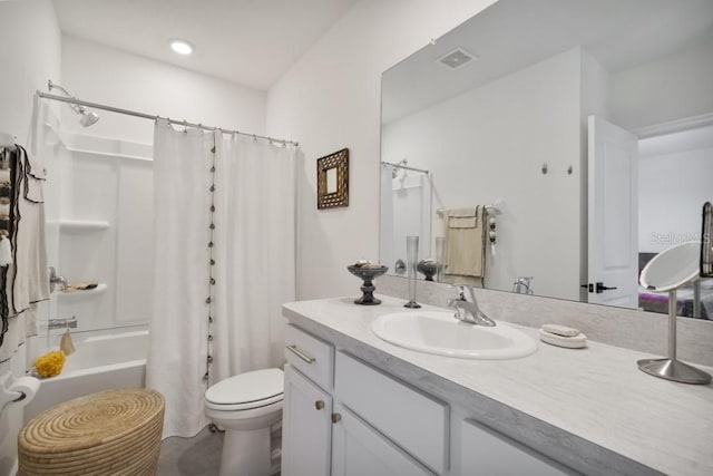 full bathroom featuring vanity, toilet, and shower / bath combo with shower curtain