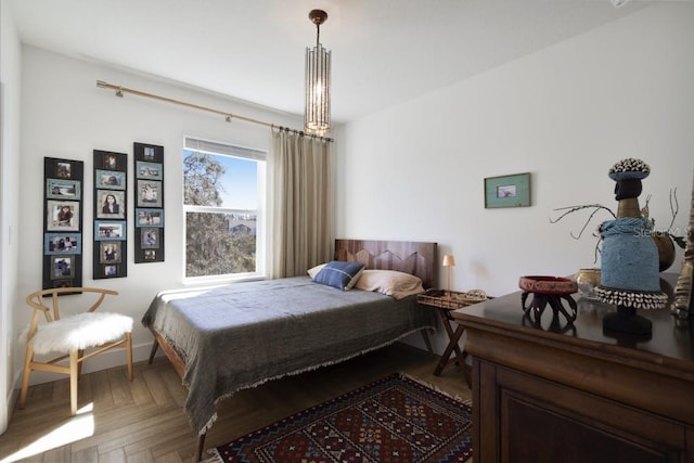 bedroom with parquet flooring