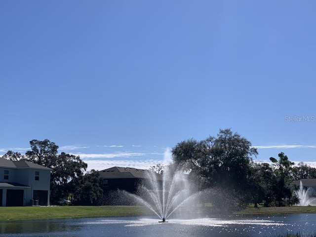 exterior space with a water view